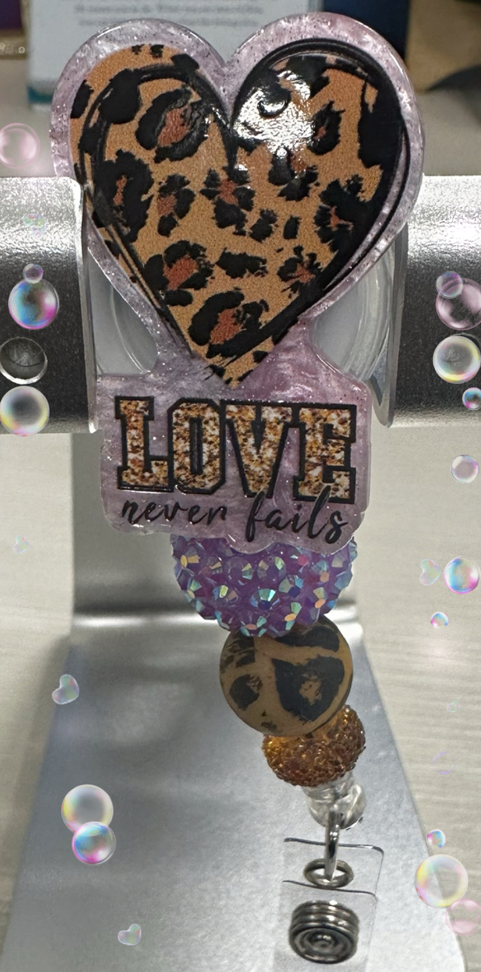 Love Never Fail Badge Reel
