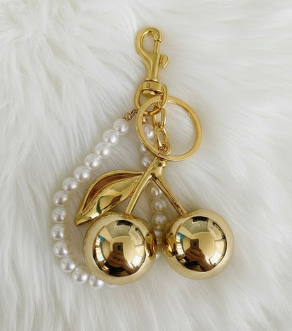 🍒 Gold Cherry Keychain with Pearl Handle – Elegant Bag & Purse Charm