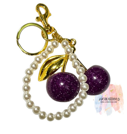 🍒 Elegant Cherry Keychain with Pearl Handle – Gold & Purple Glitter