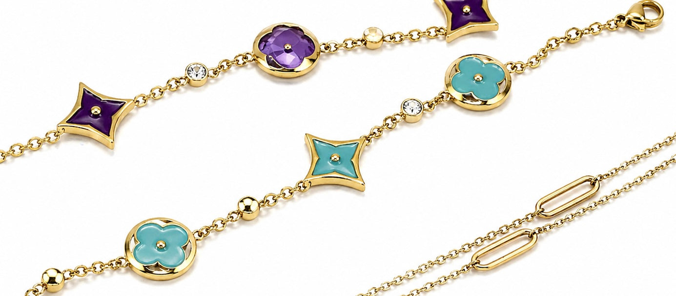 gold-tone charm bracelet featuring stunning turquoise enamel accents.