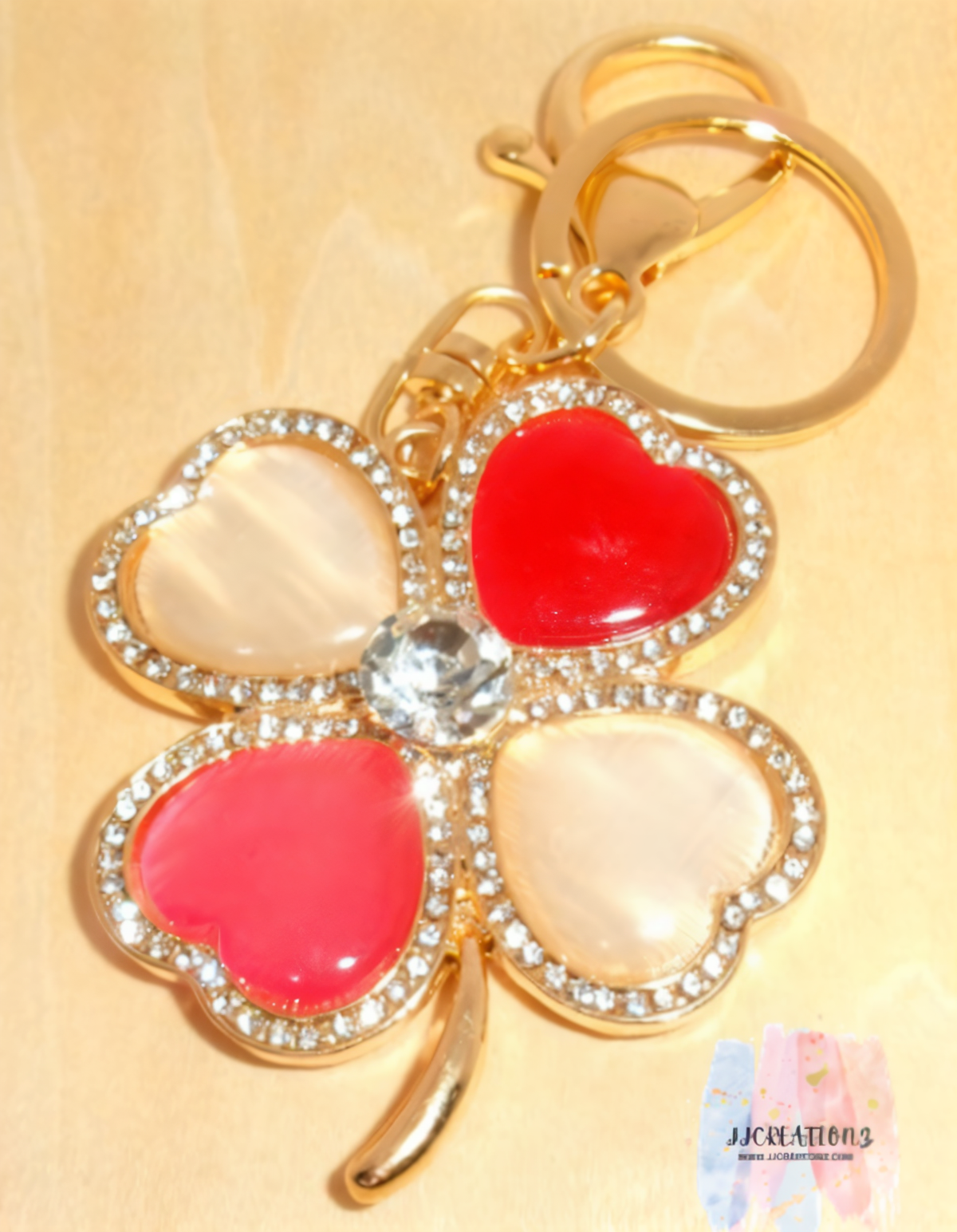 Four-Leaf Heart Clover Keychain – Gold, Red & Pink Enamel Charm