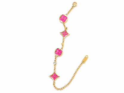 gold-tone charm bracelet featuring stunning turquoise enamel accents.