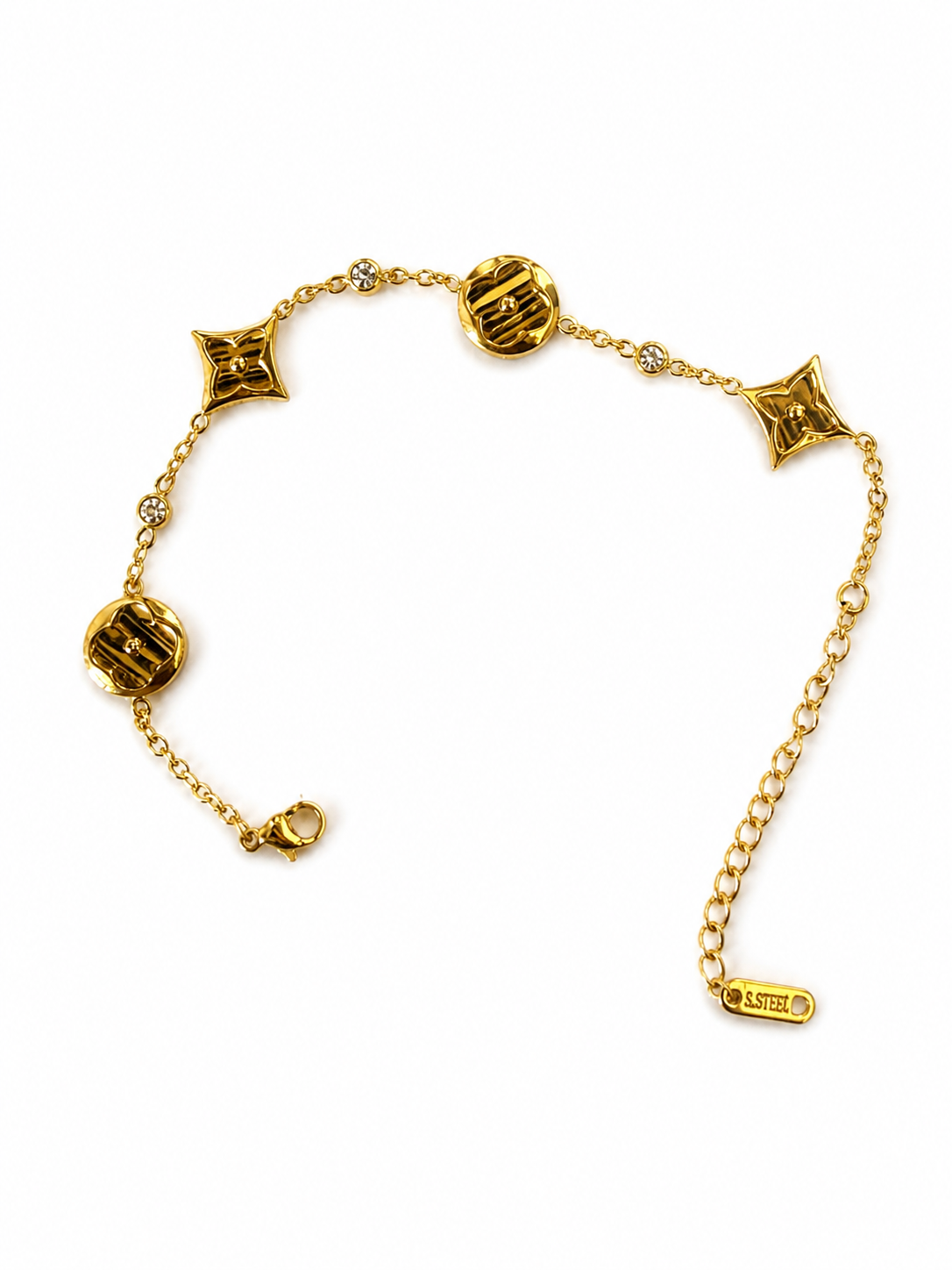 gold-tone charm bracelet featuring stunning turquoise enamel accents.