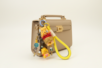 Winnie-themed Charm Keychain – Sparkle Edition 💛✨