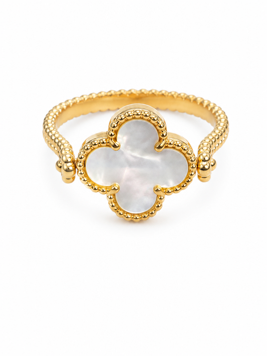 Elegant gold-tone clover bracelet featuring a luminous pearl-inspired centerpiece