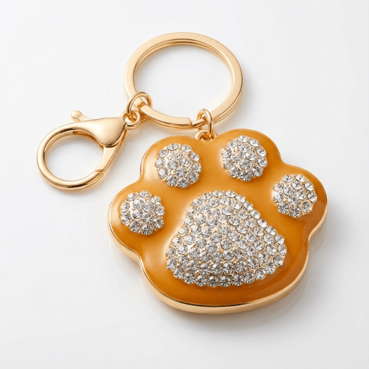 🐾 Sparkling Paw Print Keychain – Gold Tone with Rhinestones