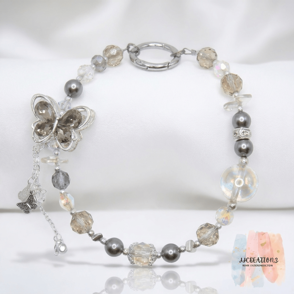 Crystal Butterfly Phone Charm – Grey Pearl & Iridescent Beaded Accessory